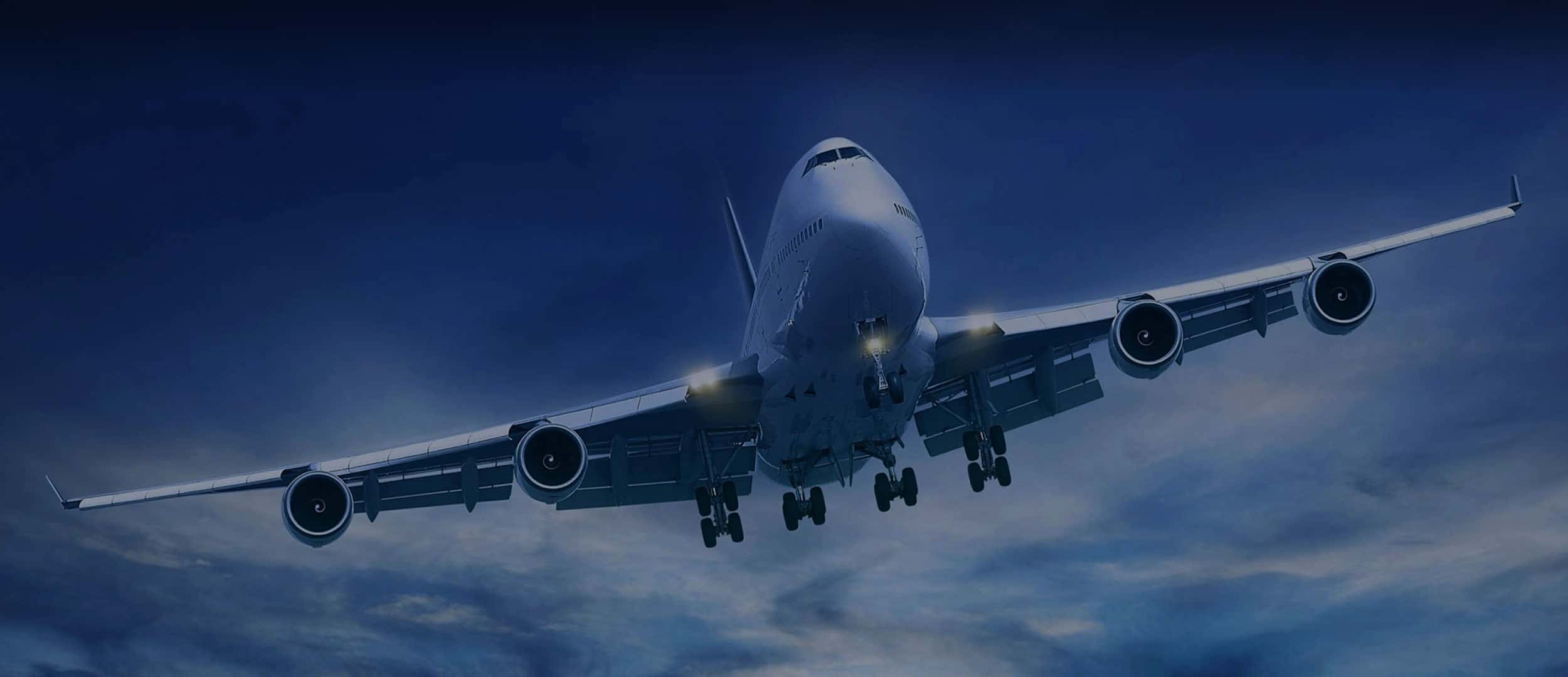 A light-contrasted cargo plane, representing freight services